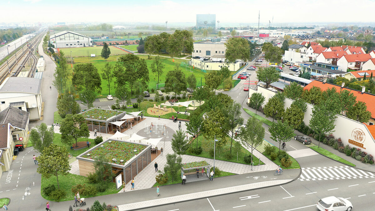 Planungsskizze vom neuen Lindheimplatz neben Bahnhof Wiener Neudorf. Brunnen in der Mitte, viel Grün, Kaffeehaus und Imbissstand, Spielplatz, und viele Bäume.